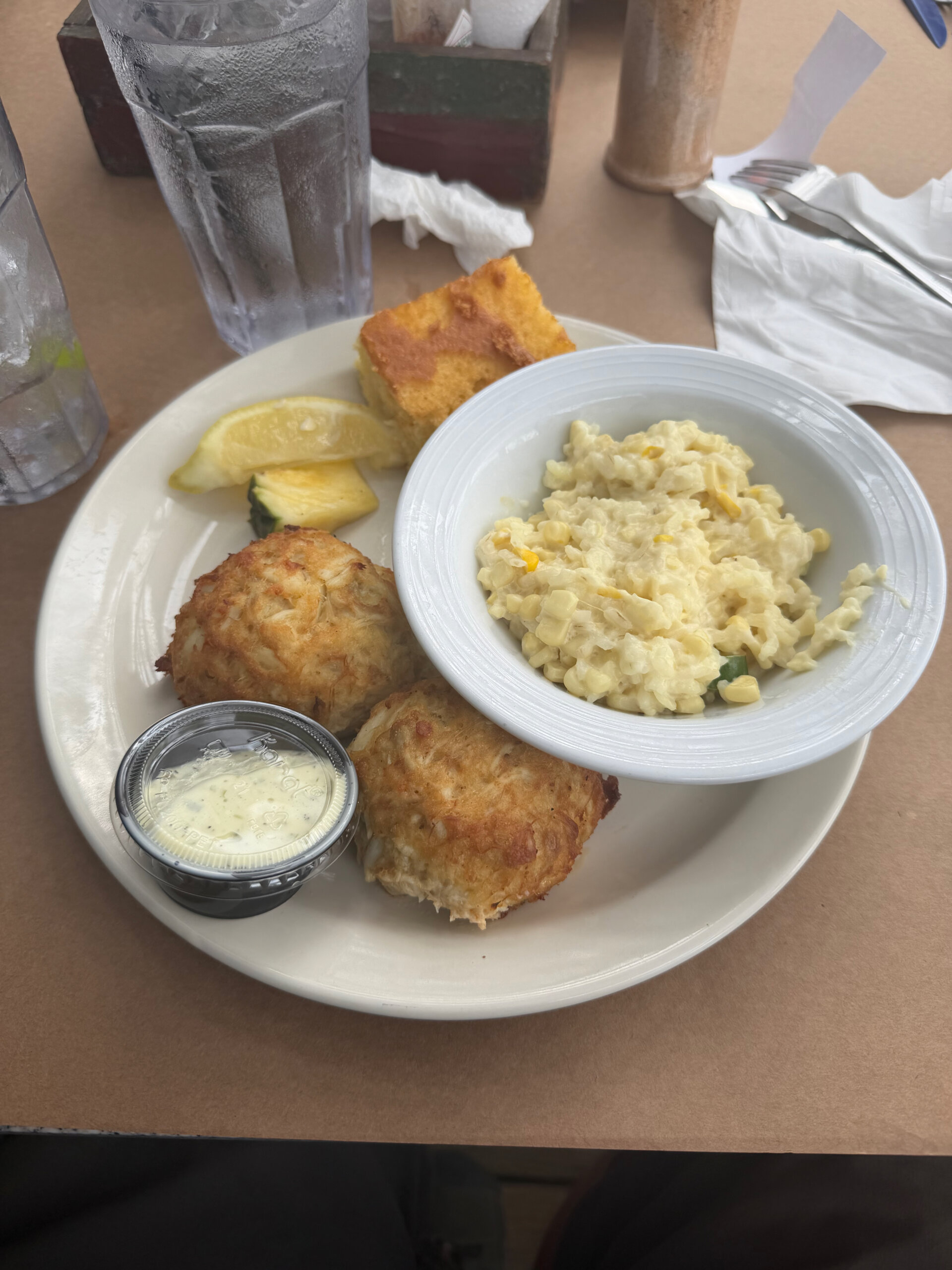 Two crab cakes, cornbread, and Maryland mac and cheese.