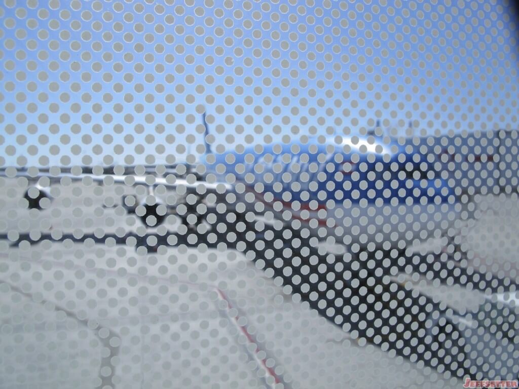 I finally get a view of the plane only to have it obscured by a window pattern