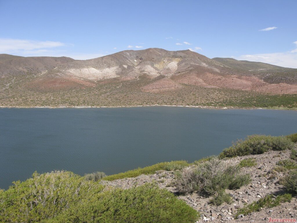 Beautiful Mountain rising above lake