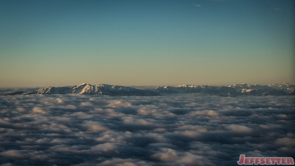 European Alps Emerging Throught the Clouds