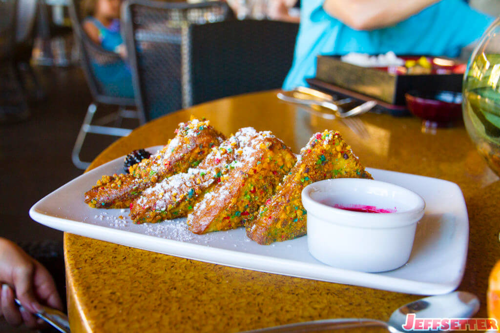 Cereal-crusted French Toast with fresh Berries and Raspberry Coulis - breakfast