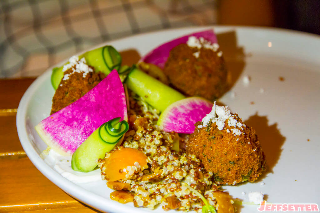 Mung Bean Falafel: coconut tzatziki, kumquat, bacon powder