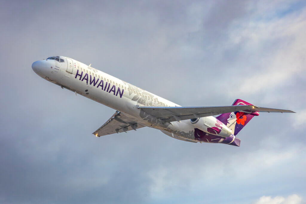 Hawaiian Airlines Boeing 717 flying overhead