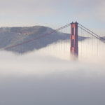 Golden Gate Bridge pier wrapped in fog