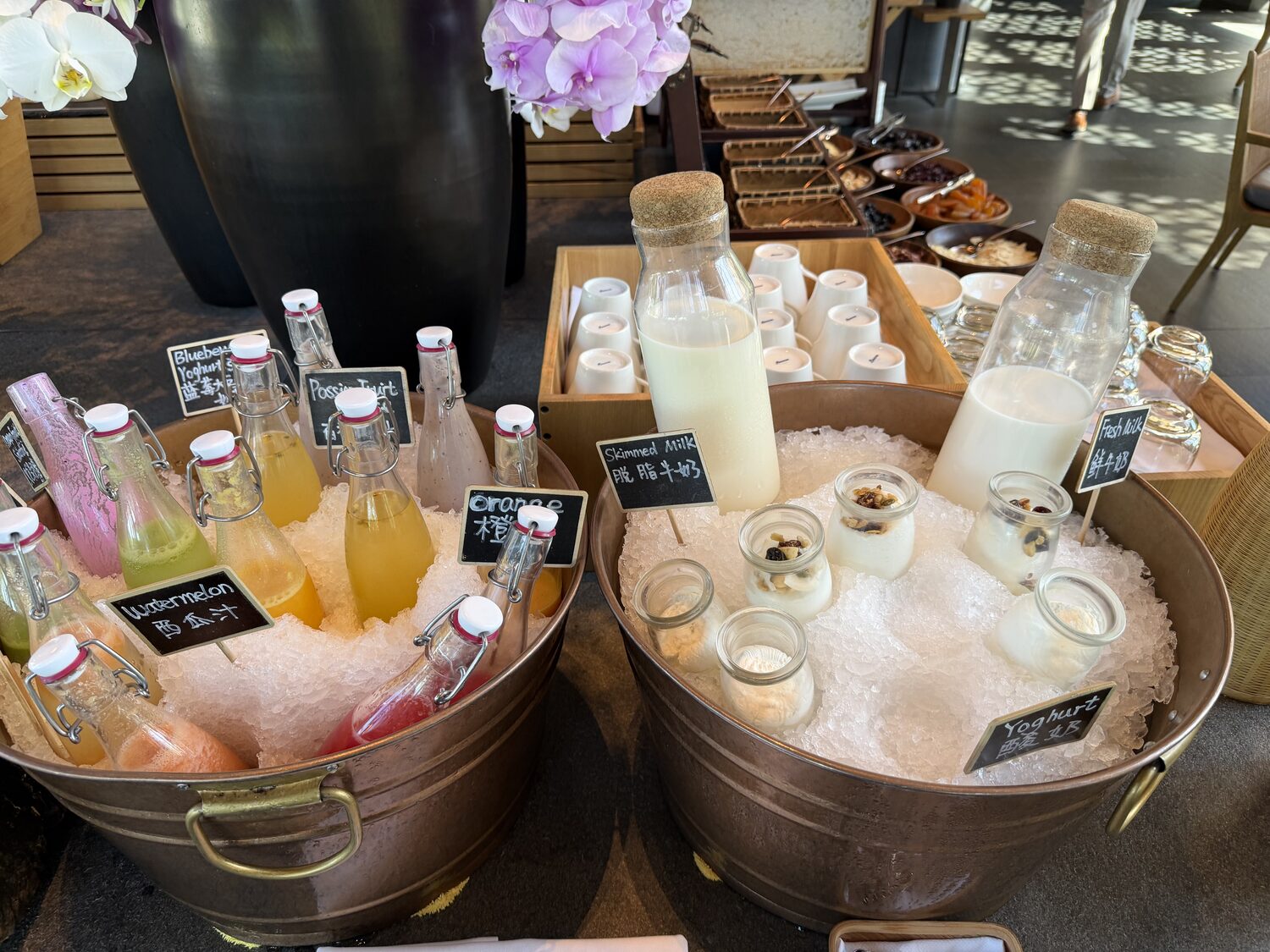 Juices and milk, on ice.