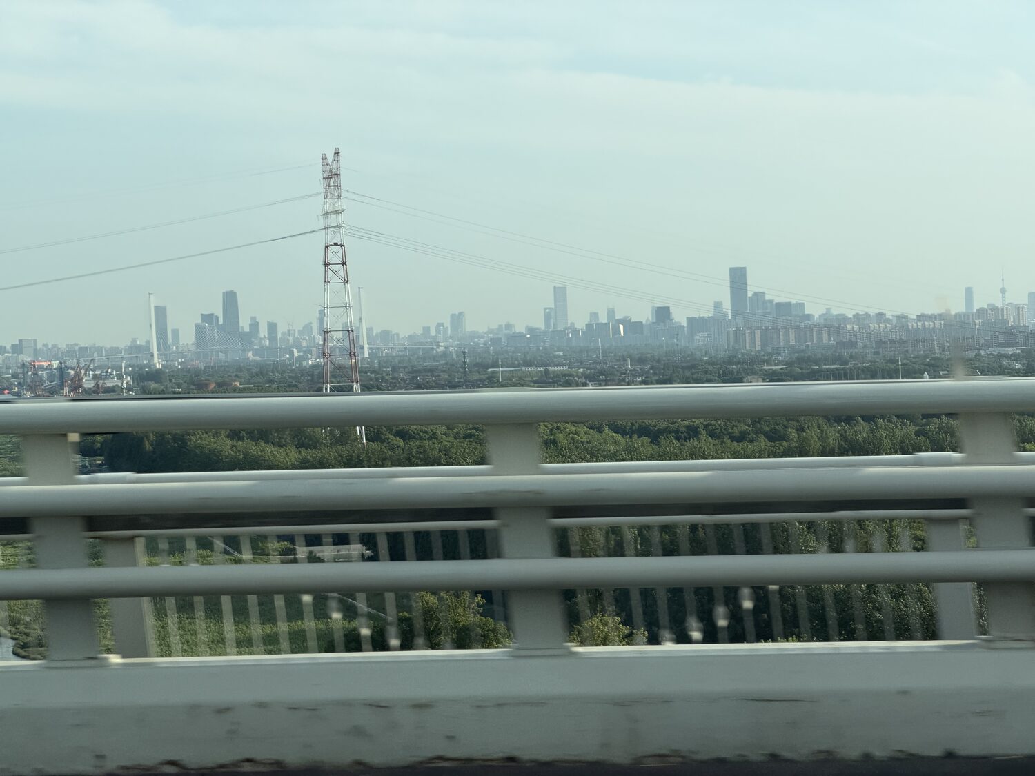 Shanghai in the distance, from the bridge.